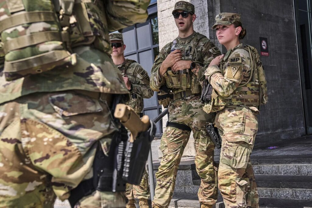 National guard start carrying firearms in DC as Trump says Chicago may be next | Washington DC – The Guardian