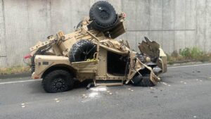 Military vehicle crashes into car in DC as states send more national guard troops – The Guardian