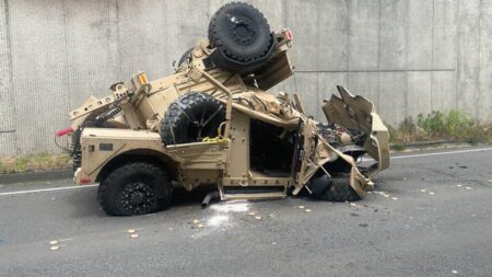 Military vehicle crashes into car in DC as states send more national guard troops – The Guardian